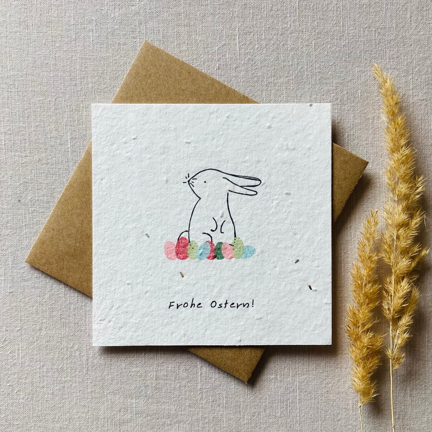 Einpflanzbare Karte aus handgemachtem Saatpapier | Frohe Ostern Hasen mit Ostereier