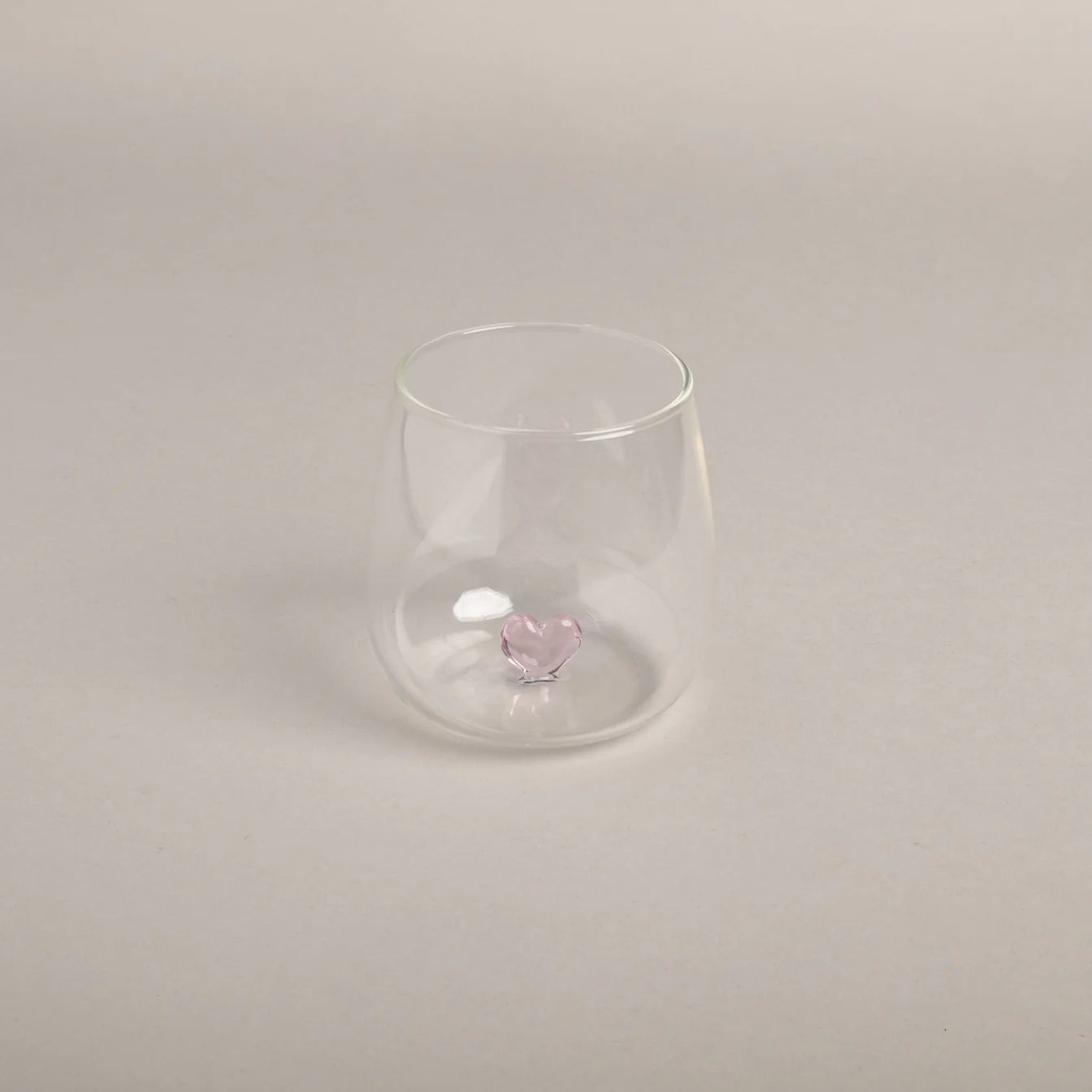 Trinkglas Herzfigur rosa