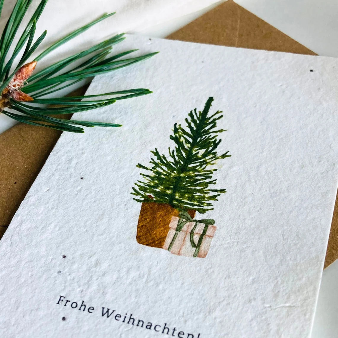 Einpflanzbare Karte aus handgemachtem Saatpapier | Frohe Weihnachten Baum